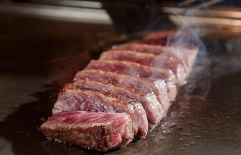 Sliced A5 heifer wagyu steak — the Queen of Wagyu — on the teppan at an Arc restaurant in Kyoto